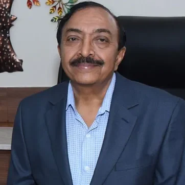 Dr. H.B. Patel, senior gynaecologist at Nisha IVF Centre Bopal Ahmedabad